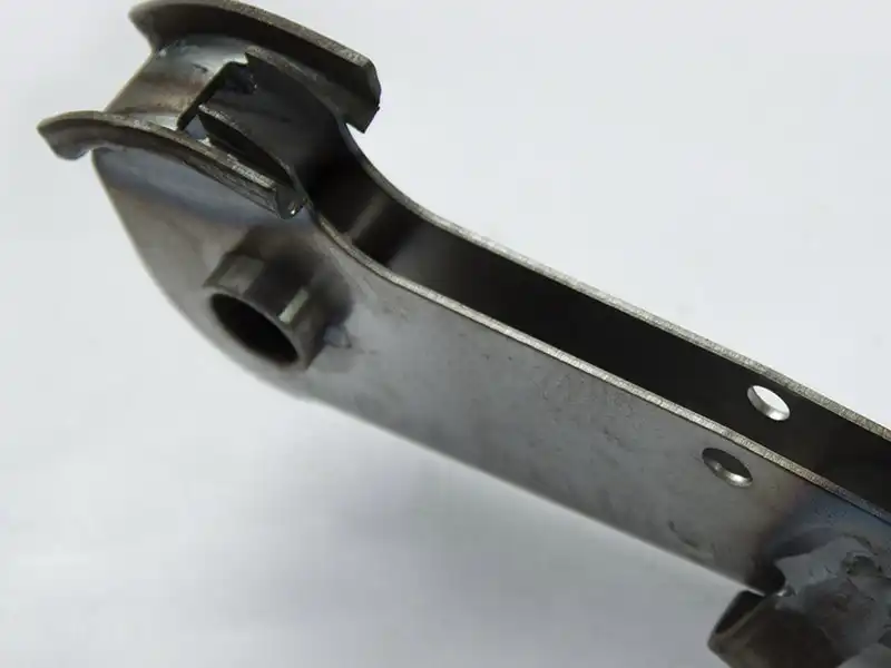 Formed and welded tractor brake handle assembly